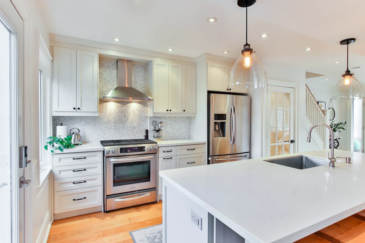 Pre-assembled kitchen cabinets installed in a bright kitchen